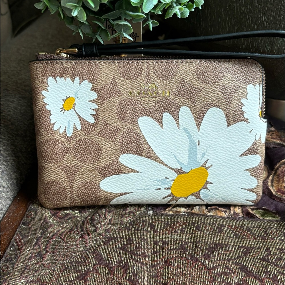 Authentic COACH Signature floral coated canvas/leather zip wristlet